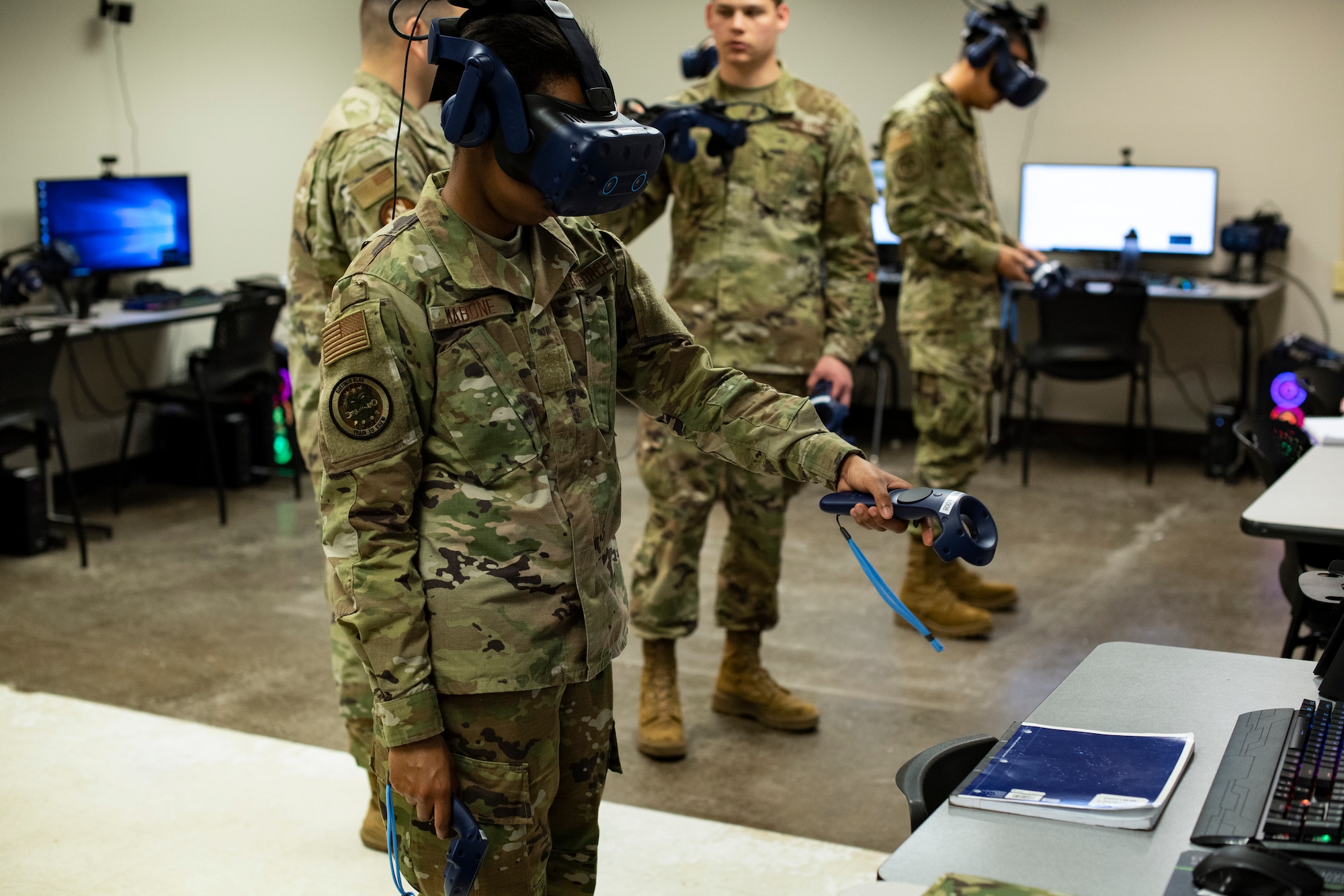 Airman Leeah Mabone, a 362nd Training Squadron heavy crew chief student, uses virtual reality during a classroom training session at Sheppard Air Force Base, Texas, March 3, 2020. Mabone and other Airmen in her class are a part of a Maintenance Next test class that introduces and gauges the effectiveness of using virtual reality and other technologies in the technical training environment. (U.S. Air Force photo by John Ingle)