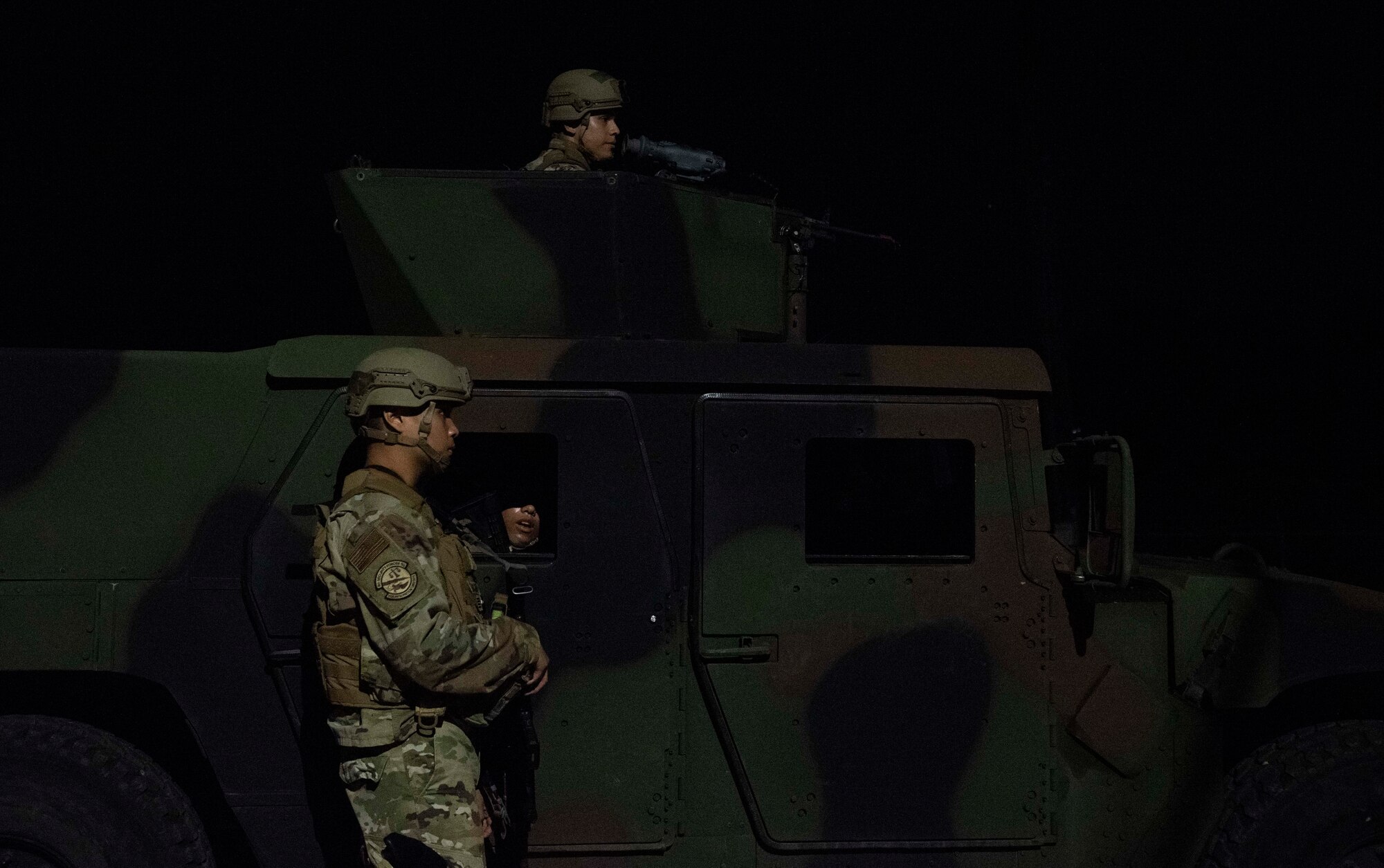 8th Security Forces Squadron Airmen participate in a routine training scenario at Kunsan Air Base, Republic of Korea, July 26, 2021. Members of the 8th SFS broke into teams and cleared buildings on Kunsan AB with the objective of locating and apprehending a criminal role player. These trainings enhance the lethality and readiness of the 8th SFS. (U.S. Air Force photo by Staff Sgt. Gabrielle Spalding)