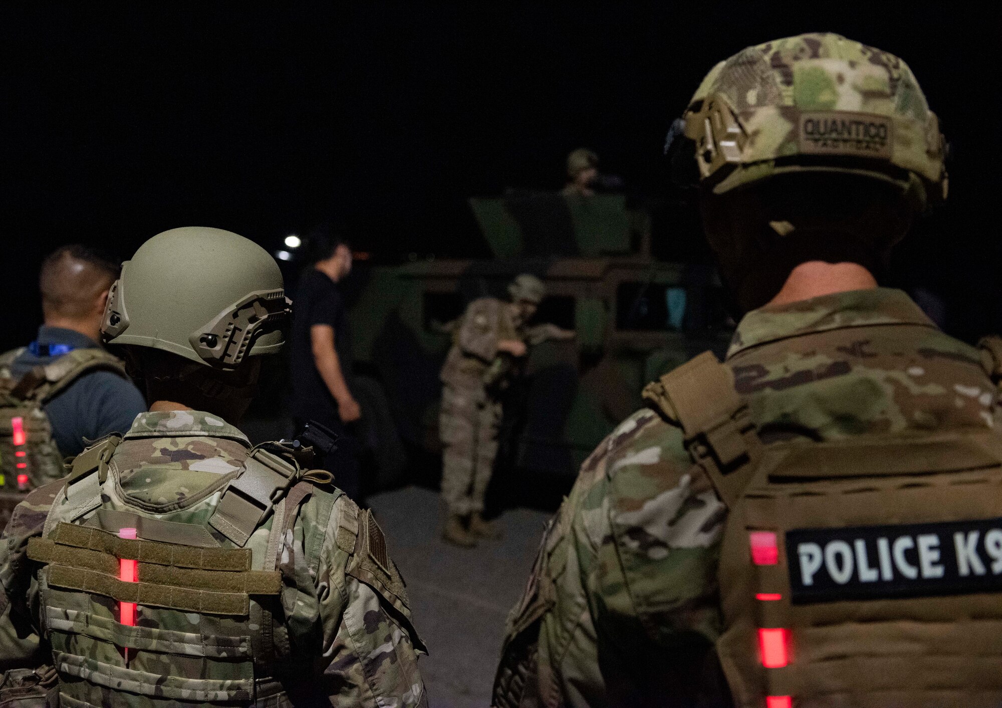 8th Security Forces Squadron Airmen participate in a routine training scenario at Kunsan Air Base, Republic of Korea, July 26, 2021. Members of the 8th SFS broke into teams and cleared buildings on Kunsan AB with the objective of locating and apprehending a criminal role player. These trainings enhance the lethality and readiness of the 8th SFS. (U.S. Air Force photo by Staff Sgt. Gabrielle Spalding)