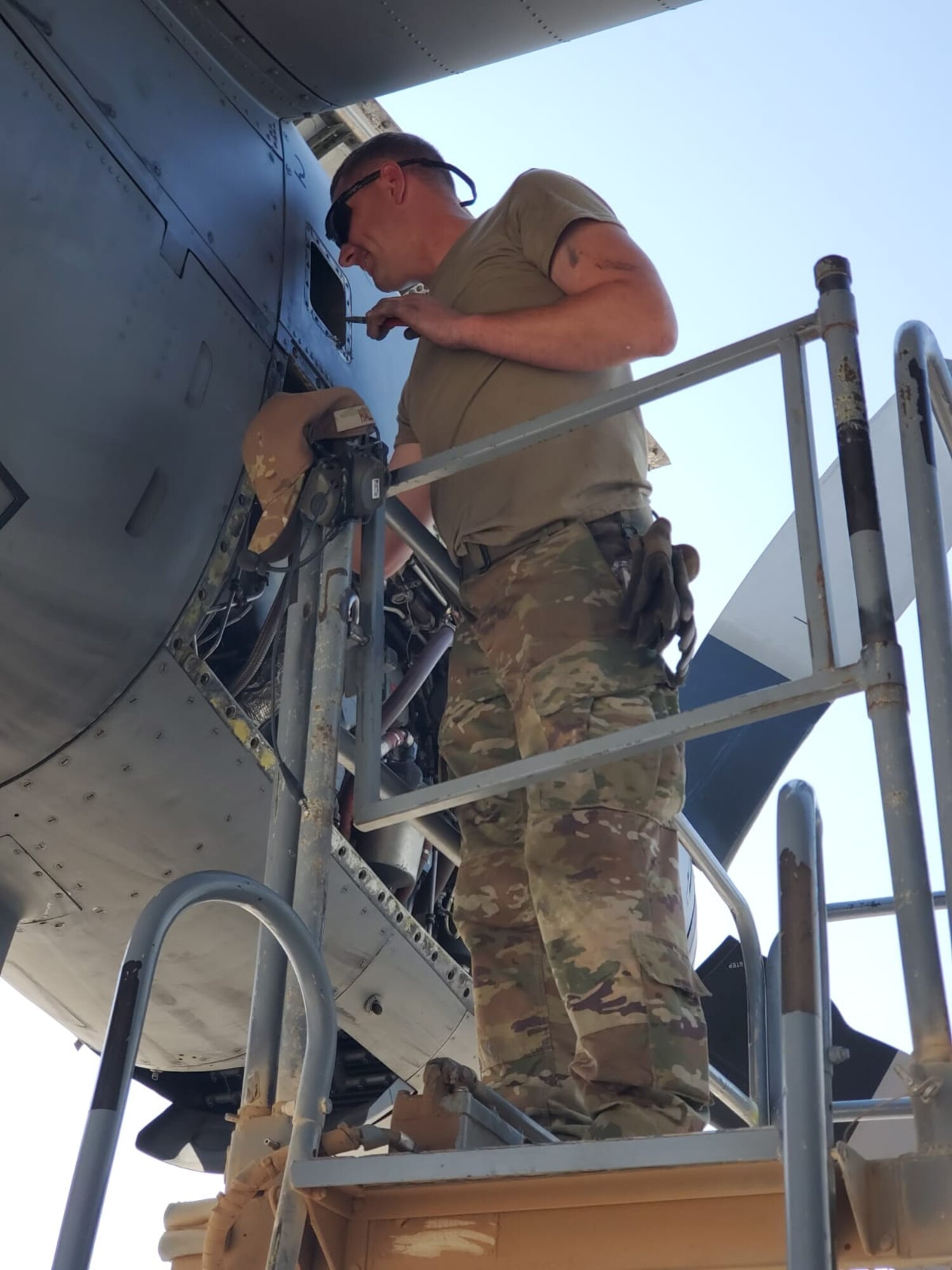 U.S. Air Force Tech. Sgt. Jonathan Hall, a propulsion technician assigned to the 386th Expeditionary Aircraft Maintenance Squadron and deployed from Maxwell Air Force Base, Alabama, trouble shoots a bleed air leak on a C-130 Hercules. The EAMXS works 24-hour operations year-round to keep the C-130 Hercules’ in flight to accomplish the mission of fight to win today and to provide warfighter support in the area of responsibility. (Courtesy Photo)