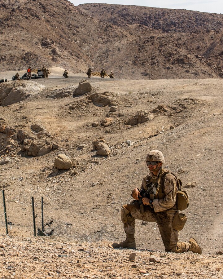 Marines with 3rd Battalion, 25th Marines, 4th Marine Division, secure an entrance into the hostile trenches at Range 400 during Integrated Training Exercise (ITX) 4-21 at Marine Corps Air Ground Combat Center Twentynine Palms, California on July 23, 2021. ITX is the culmination of Marine Forces Reserve units’ training cycle as they participate in a live-fire, combined arms exercise as a part of an integrated Marine Air Ground Task Force. (U.S. Marine Corps photo by Lance Cpl. David Intriago)