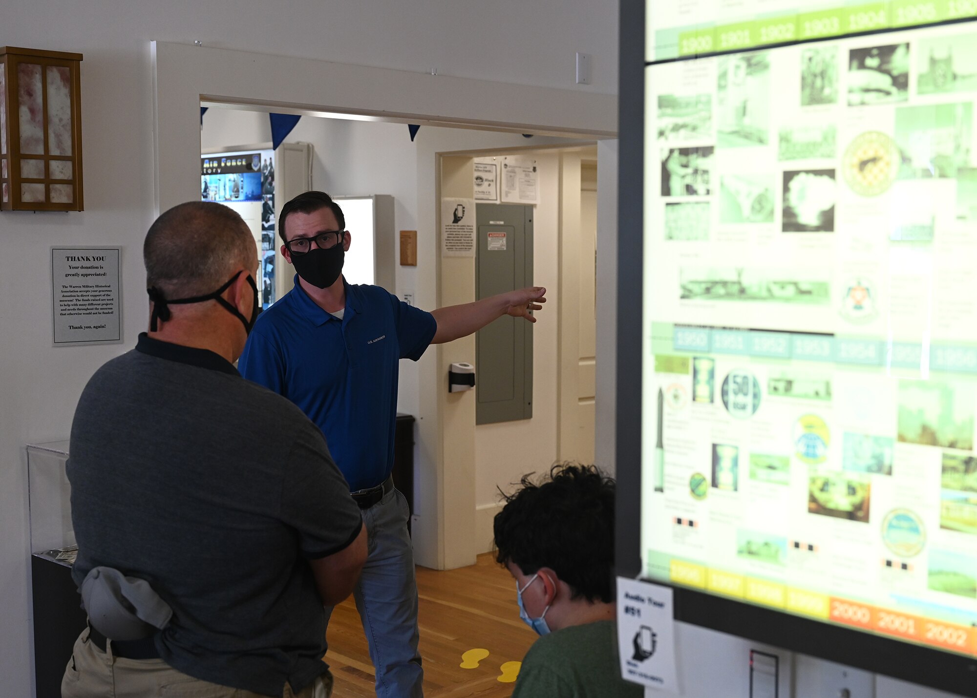 Kyle Brislan, wing historian, discusses the history of the base with visitors in the base museum as part of Fort D.A. Russell Days, July 25, 2021, on F.E. Warren Air Force Base, Wyoming. Fort D.A. Russell Days is a time for F.E. Warren Air Force Base to share its history and heritage with the community. (U. S. Air Force photo by Glenn S. Robertson)