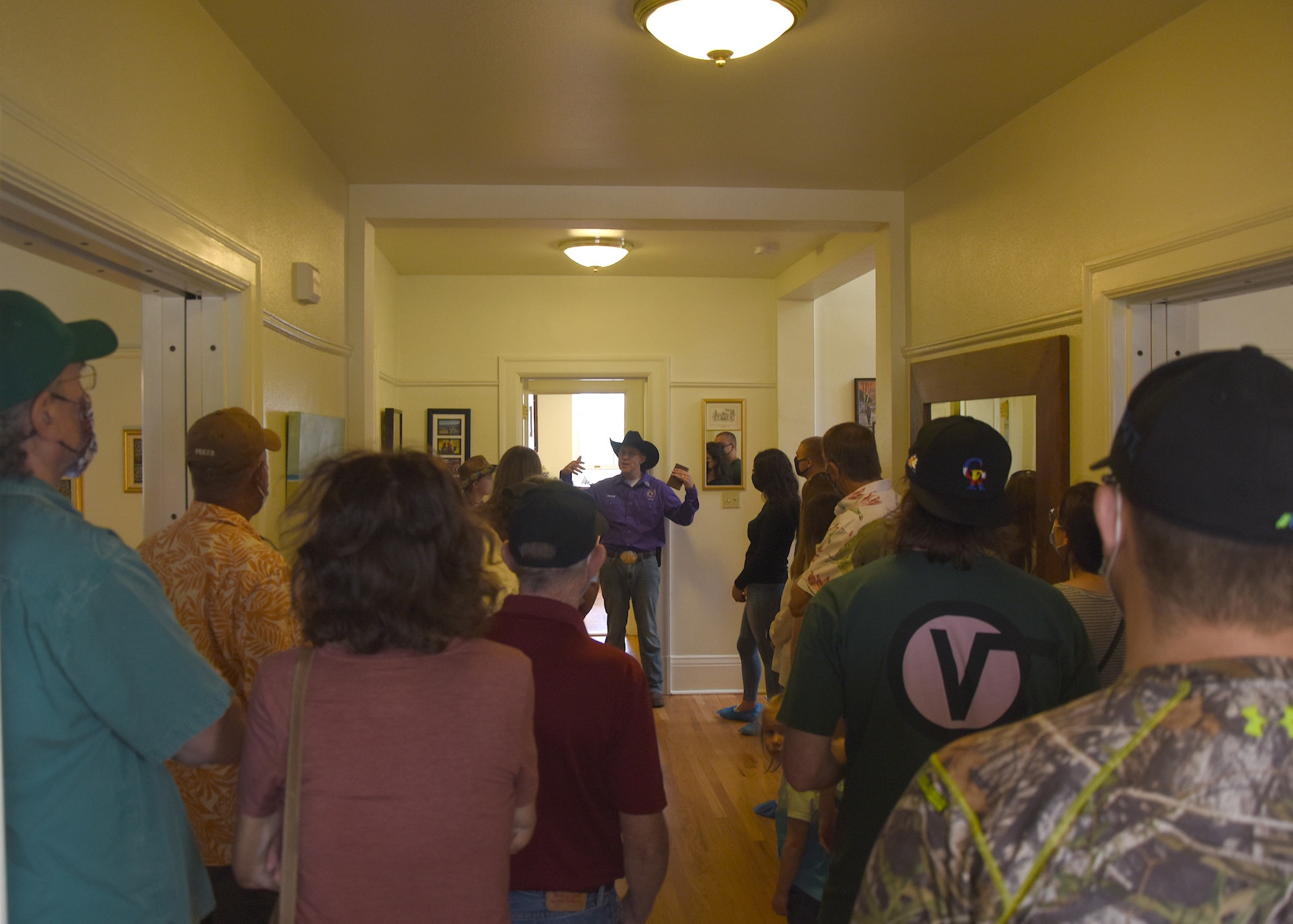 Col. Deane Konowicz, 90th Missile Wing Vice Commander, gives a tour of his home for the Historic Homes Tour, part of D.A. Russell Days, July 25, 2021, on F.E. Warren Air Force Base, Wyoming. Fort D.A. Russell Days is a time for F.E. Warren Air Force Base to share its history and heritage with the community. (U. S. Air Force photo by Maj. Haley Armstrong)