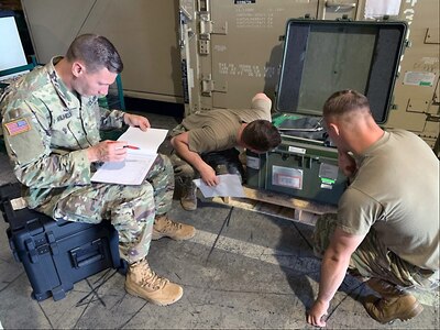 Soldiers with the 311th Field Hospital, a unit out of Blacklick, Ohio, inventory equipment for movement from Sagami Army Depot to Yokota Air Force Base for a field hospital during a training exercise in Japan in June.