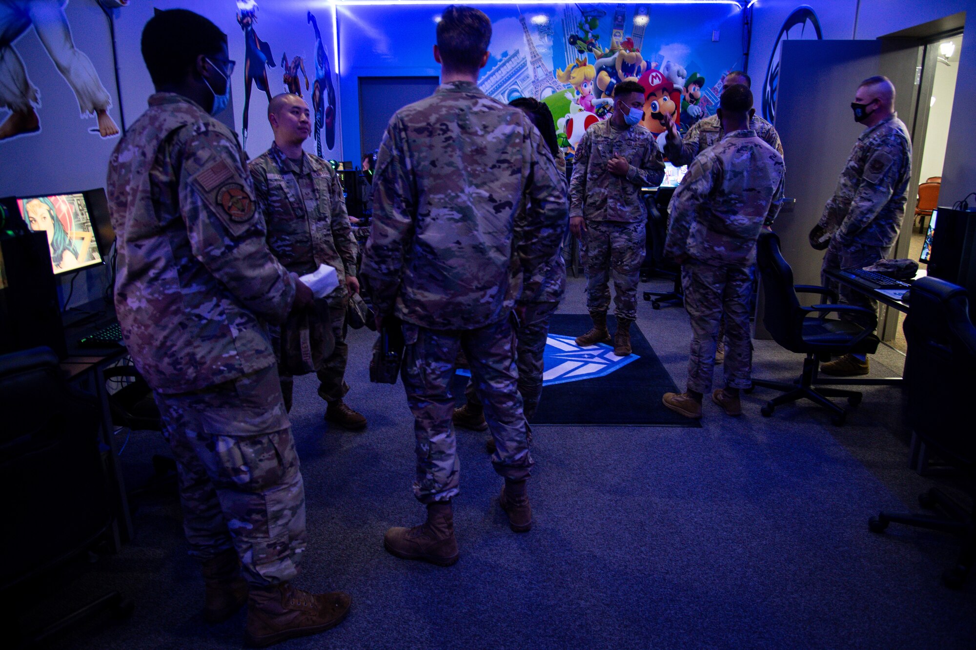 Barksdale Airmen gather inside the new e-gaming room at Barksdale Air Force Base, Louisiana, July 20, 2021.