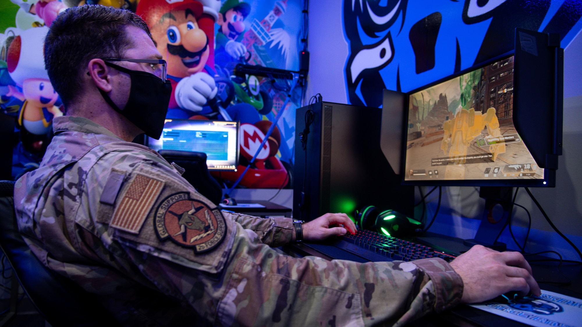 An airman tests out the new computers in the e-gaming room at Barksdale Air Force Base, Louisiana, July 20, 2021.