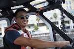 Coast Guard Petty Officer 2nd Class Alan Moriwaki, a boatswain’s mate at Coast Guard Station St. Petersburg, serves at the coxswain on a 29-foot Response Boat – Small II during Tampa Bay Lightning’s Stanley Cup Championship Boat Parade, Tampa, Florida, July 12, 2021. The Coast Guard collaborated with its interagency partners to ensure the movement of vessels in the parade, and to keep the boating public safe during the celebration. (U.S. Coast Guard photo by Petty Officer 1st Class Lisa Ferdinando)