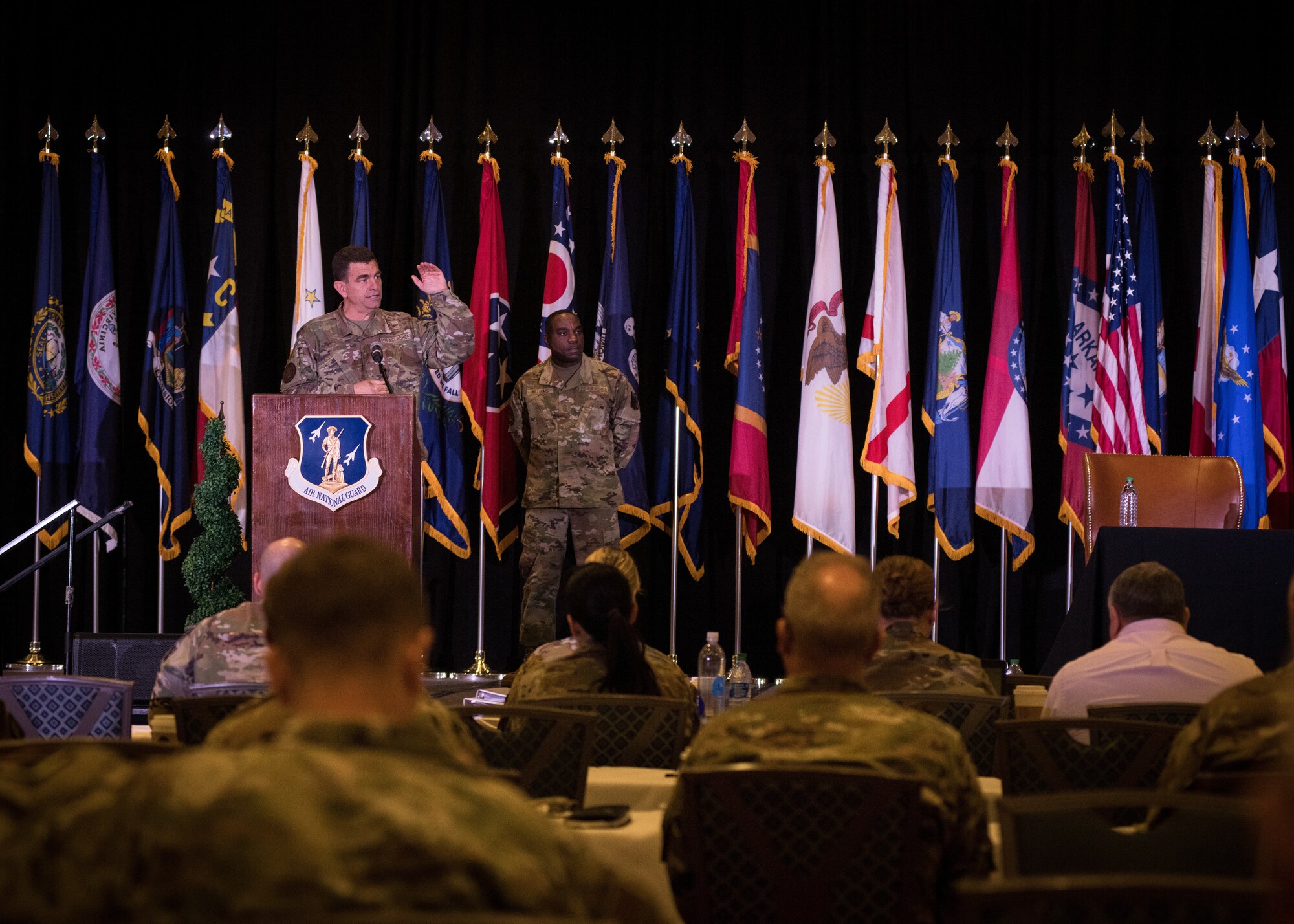 U.S. Air Force Lt. Gen. Michael A. Loh, left, director, Air National Guard, speaks during the closing ceremony of the 2021 Air National Guard Senior Leader Conference (ASLC) in St. Louis, Missouri, July 22, 2021. ASLC 21 joins together senior leaders and commanders from across the 90 wings to exchange ideas and provide input on critical matters that impact the future of the enterprise. (U.S. Air National Guard photo by Tech. Sgt. Morgan R. Whitehouse)