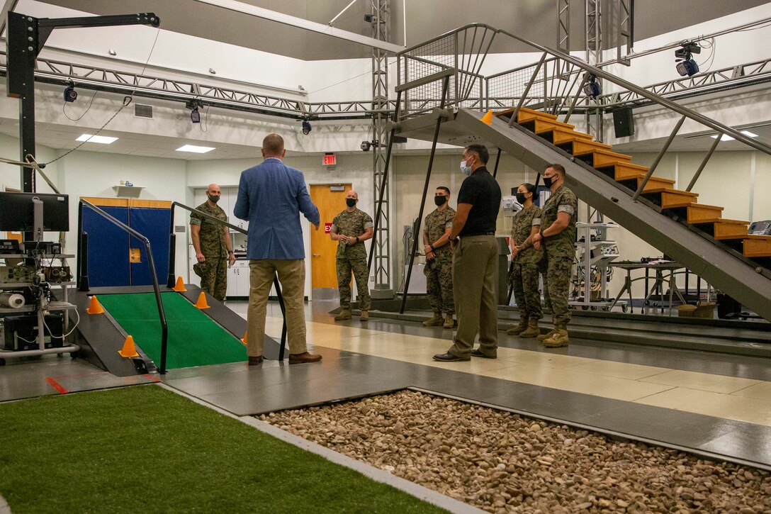 The 19th Sergeant Major of the Marine Corps, Sgt. Maj. Troy E. Black, tours the Intrepid Center at the Brooke Army Medical Center, San Antonio, Texas, July 20, 2021. The Sergeant Major of the Marine Corps conducted the tour to get an update on the research and recovery facilities that support Wounded Warrior Battalion-East, San Antonio detachment. Wounded Warrior Battalion supports recovery, and non-medical care of combat and non-combat wounded, ill, and injured Marines, and sailors attached to Marine units, and their family members in order to maximize their recovery as they return to duty or transition to civilian life. (U.S. Marine Corps photo by Sgt. Victoria Ross)
