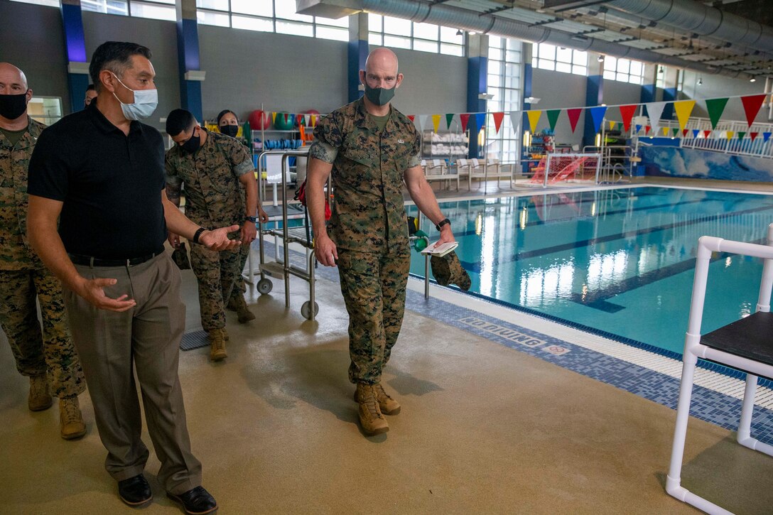 The 19th Sergeant Major of the Marine Corps, Sgt. Maj. Troy E. Black, tours the Intrepid Center at the Brooke Army Medical Center, San Antonio, Texas, July 20, 2021. The Sergeant Major of the Marine Corps conducted the tour to get an update on the research and recovery facilities that support Wounded Warrior Battalion-East, San Antonio detachment. Wounded Warrior Battalion supports recovery, and non-medical care of combat and non-combat wounded, ill, and injured Marines, and sailors attached to Marine units, and their family members in order to maximize their recovery as they return to duty or transition to civilian life. (U.S. Marine Corps photo by Sgt. Victoria Ross)