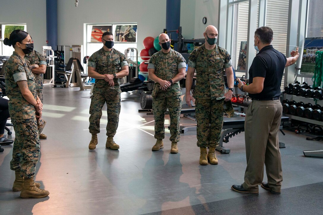 The 19th Sergeant Major of the Marine Corps, Sgt. Maj. Troy E. Black, tours the Intrepid Center at the Brooke Army Medical Center, San Antonio, Texas, July 20, 2021. The Sergeant Major of the Marine Corps conducted the tour to get an update on the research and recovery facilities that support Wounded Warrior Battalion-East, San Antonio detachment. Wounded Warrior Battalion supports recovery, and non-medical care of combat and non-combat wounded, ill, and injured Marines, and sailors attached to Marine units, and their family members in order to maximize their recovery as they return to duty or transition to civilian life. (U.S. Marine Corps photo by Sgt. Victoria Ross)