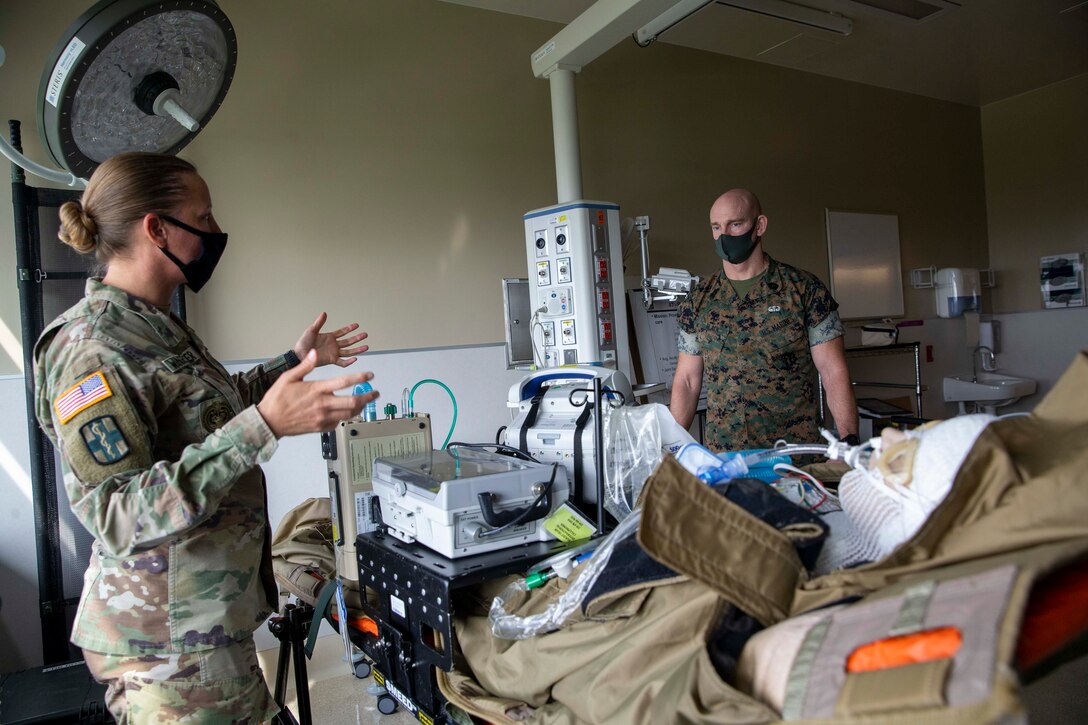 The 19th Sergeant Major of the Marine Corps, Sgt. Maj. Troy E. Black, tours the Brooke Army Medical Center, San Antonio, Texas, July 20, 2021. The Sergeant Major of the Marine Corps conducted the tour to get an update on the research and recovery facilities that support Wounded Warrior Battalion-East, San Antonio detachment. Wounded Warrior Battalion supports recovery, and non-medical care of combat and non-combat wounded, ill, and injured Marines, and sailors attached to Marine units, and their family members in order to maximize their recovery as they return to duty or transition to civilian life. (U.S. Marine Corps photo by Sgt. Victoria Ross)