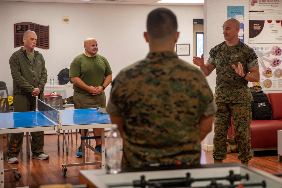 The 19th Sergeant Major of the Marine Corps, Sgt. Maj. Troy E. Black, addresses Marines at the Wounded Warrior Battalion-East, San Antonio detachment at the Brooke Army Medical Center, San Antonio, Texas, July 20, 2021. The Sergeant Major of the Marine Corps spoke to the Marines and staff to share with them his perspective as the senior most enlisted Marine in the Marine Corps. Wounded Warrior Battalion supports recovery, and non-medical care of combat and non-combat wounded, ill, and injured Marines, and sailors attached to Marine units, and their family members in order to maximize their recovery as they return to duty or transition to civilian life. (U.S. Marine Corps photo by Sgt. Victoria Ross)