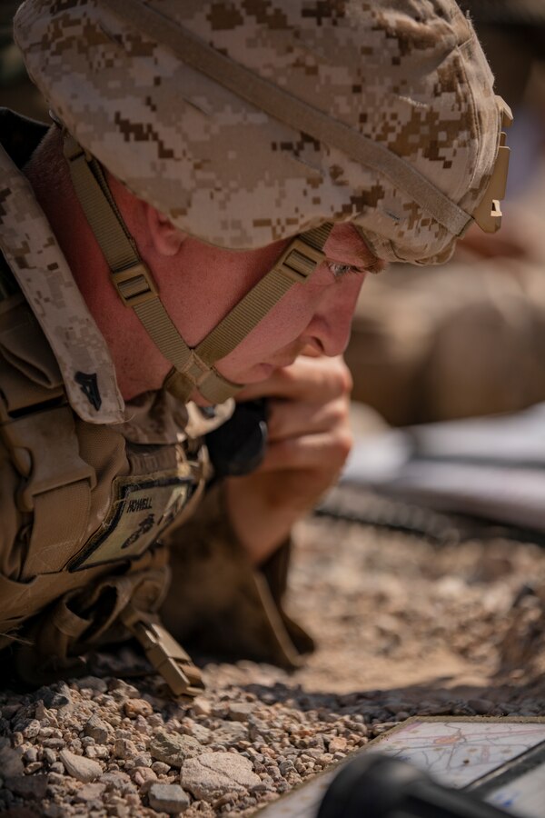 Cpl. Tyler Howell, a forward air observer with 3rd Battalion, 25th Marines, takes part in Fire Support Coordination Exercise (FSCEX) 1, a sub-event of Integrated Training Exercise (ITX) 4-21 at Marine Corps Air Ground Combat Center, Twentynine Palms, California on July 22, 2021. FSCEX allows Reserve Marines to coordinate various fires assets from across Marine Air Ground Task Force 25 to eliminate enemy positions in a simulated combat environment. (U.S. Marine Corps photo by Sgt. JVonnta Taylor)