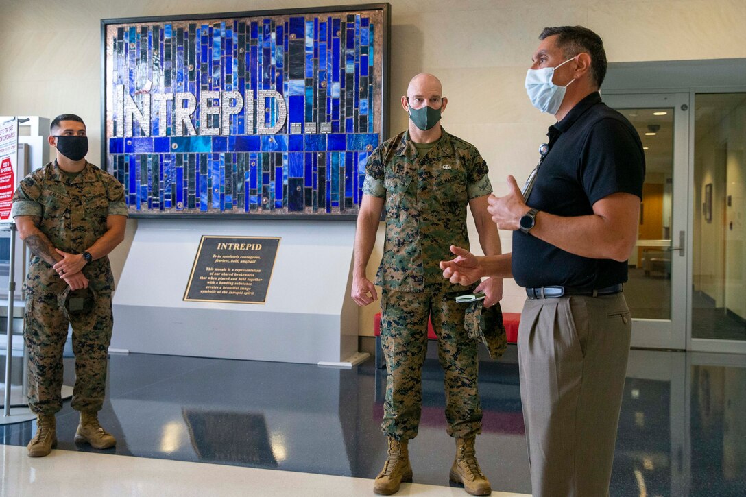 The 19th Sergeant Major of the Marine Corps, Sgt. Maj. Troy E. Black, tours the Intrepid Center at the Brooke Army Medical Center, San Antonio, Texas, July 20, 2021. The Sergeant Major of the Marine Corps conducted the tour to get an update on the research and recovery facilities that support Wounded Warrior Battalion-East, San Antonio detachment. Wounded Warrior Battalion supports recovery, and non-medical care of combat and non-combat wounded, ill, and injured Marines, and sailors attached to Marine units, and their family members in order to maximize their recovery as they return to duty or transition to civilian life. (U.S. Marine Corps photo by Sgt. Victoria Ross)