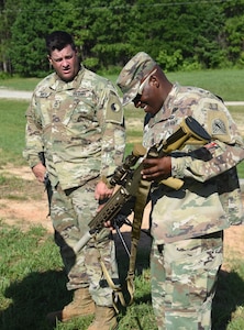 Virginia and Kentucky National Guard Soldiers assigned to the 116th Infantry Brigade Combat Team conduct a live-fire range with the M110A1 Squad Designated Marksman Rifle during a new equipment training and fielding July 14, 2021, at Fort Pickett, Virginia.