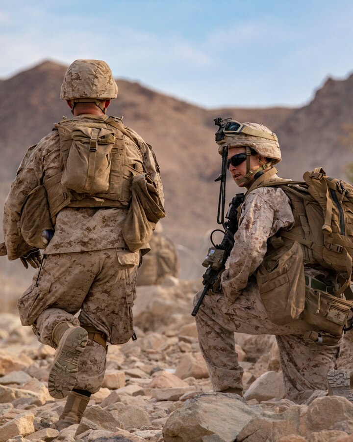 Marines with India Company, 3rd Battalion, 25th Marines, 4th Marine Division, prepare to advance on an enemy position on Range 410A during Integrated Training Exercise (ITX) 4-21 at Marine Corps Air Ground Combat Center Twentynine Palms, California on July 22. Range 410A provides Reserve Marines the opportunity to execute a fire and maneuver attack supported by mortarmen, machine gunners and combat engineers. (U.S. Marine Corps photo by Sgt. JVonnta Taylor)