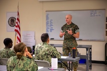 The 19th Sergeant Major of the Marine Corps, Sgt. Maj. Troy E. Black, addresses sailors at the Navy Medicine Training Support Center, Fort Sam Houston, San Antonio, Texas, July 21, 2021. The Sergeant Major of the Marine Corps spoke to the Sailors to share with them his perspective as the senior most enlisted Marine in the Marine Corps. The Navy Medicine Training Support Center (NMTSC) is the Navy component command that provides administrative and operational control over Navy staff and students assigned to the Medical Education & Training Campus (METC) and other medical programs in the San Antonio area. (U.S. Marine Corps photo by Sgt. Victoria Ross)