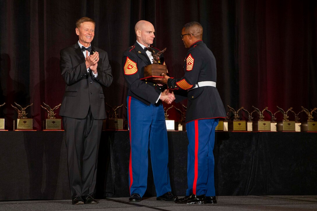 The 19th Sergeant Major of the Marine Corps, Sgt. Maj. Troy E. Black, attends the Marine Corps Aviation Association (MCAA) Awards Banquet, Dallas, Tx, July 22, 2021. The Sergeant Major of the Marine Corps attended to present the Marine aviators who received 2021 awards. The MCAA is a non-profit organization that recognizes professional excellence in Marine aviation, educates the public on its history and heritage, and annually awards 28 Marine Corps Aviation Awards. (U.S. Marine Corps photo by Sgt. Victoria Ross)