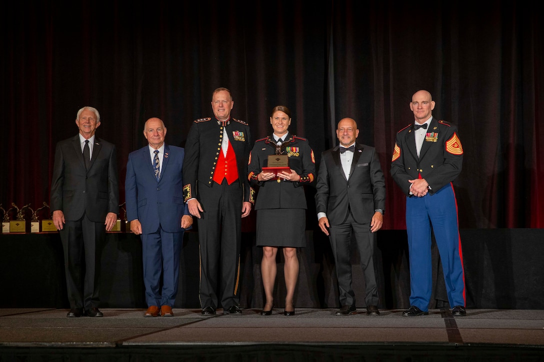The 19th Sergeant Major of the Marine Corps, Sgt. Maj. Troy E. Black, attends the Marine Corps Aviation Association (MCAA) Awards Banquet, Dallas, Tx, July 22, 2021. The Sergeant Major of the Marine Corps attended to present the Marine aviators who received 2021 awards. The MCAA is a non-profit organization that recognizes professional excellence in Marine aviation, educates the public on its history and heritage, and annually awards 28 Marine Corps Aviation Awards. (U.S. Marine Corps photo by Sgt. Victoria Ross)
