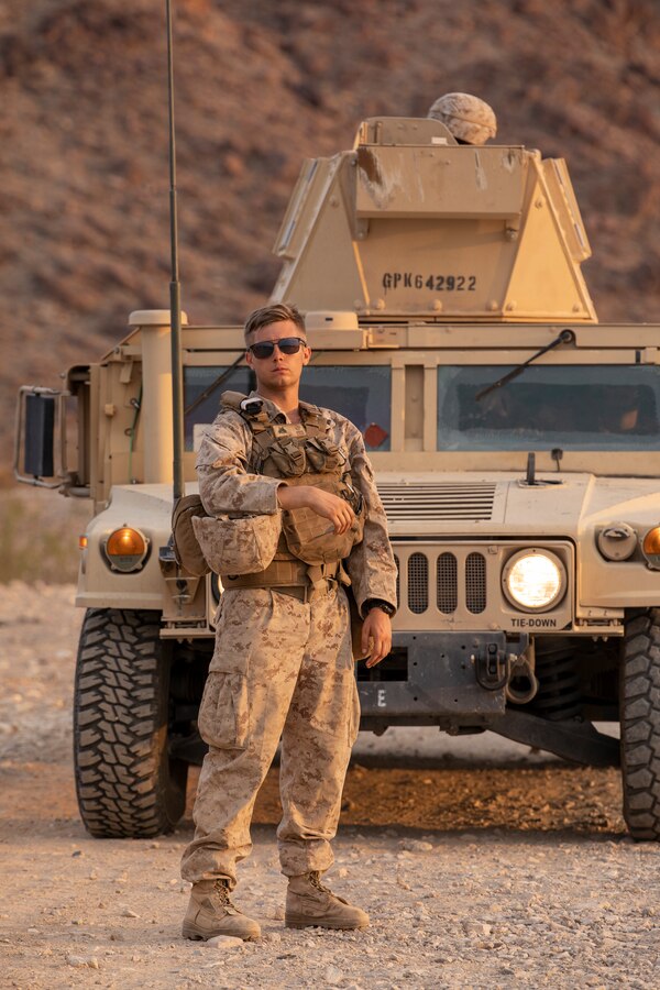 A Marine with 3rd Battalion, 25th Marines, 4th Marine Division, ground guides a Humvee on Range 400 during Integrated Training Exercise (ITX) 4-21 at Marine Corps Air Ground Combat Center, Twentynine Palms, California on July 22. ITX is the culmination of Marine Forces Reserve units’ training cycle as they participate in a live-fire, combined arms exercise as a part of an integrated Marine Air Ground Task Force. (U.S. Marine Corps photo by Sgt. JVonnta Taylor)