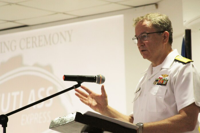 (July 26, 2021) Rear Adm. Jeffrey Spivey, Director, Maritime Partnership Program, U.S. Naval Force Europe-Africa, U.S. Sixth Fleet, delivers remarks during the opening ceremony of exercise Cutlass Express 2021 held at the Seychelles Coast Guard Academy in Victoria, Seychelles, July 26, 2021. Cutlass Express is designed to improve regional cooperation, maritime domain awareness and information sharing practices to increase capabilities between the U.S., East African and Western Indian Ocean nations to counter illicit maritime activity.