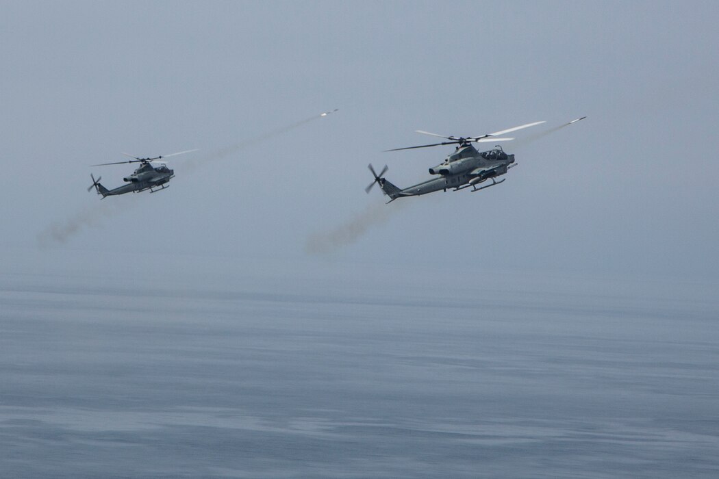 AH-1Z Viper’s with Marine Light Attack Helicopter Squadron (HMLA) 469, Marine Aircraft Group 39, 3rd Marine Aircraft Wing (MAW) launch flares in order to mark a target during defensive counter air operations in support of Summer Fury 21 in Fleta Hot airspace off the coast of California, July 13, 2021. HMLA-469 deployed two AH-1Z Viper’s loaded with Air Intercept Missile (AIM) 9 Sidewinders to neutralize an unmanned aerial system in order to maintain a competitive edge over our adversaries. (U.S. Marine Corps photo by Cpl. Levi Voss)