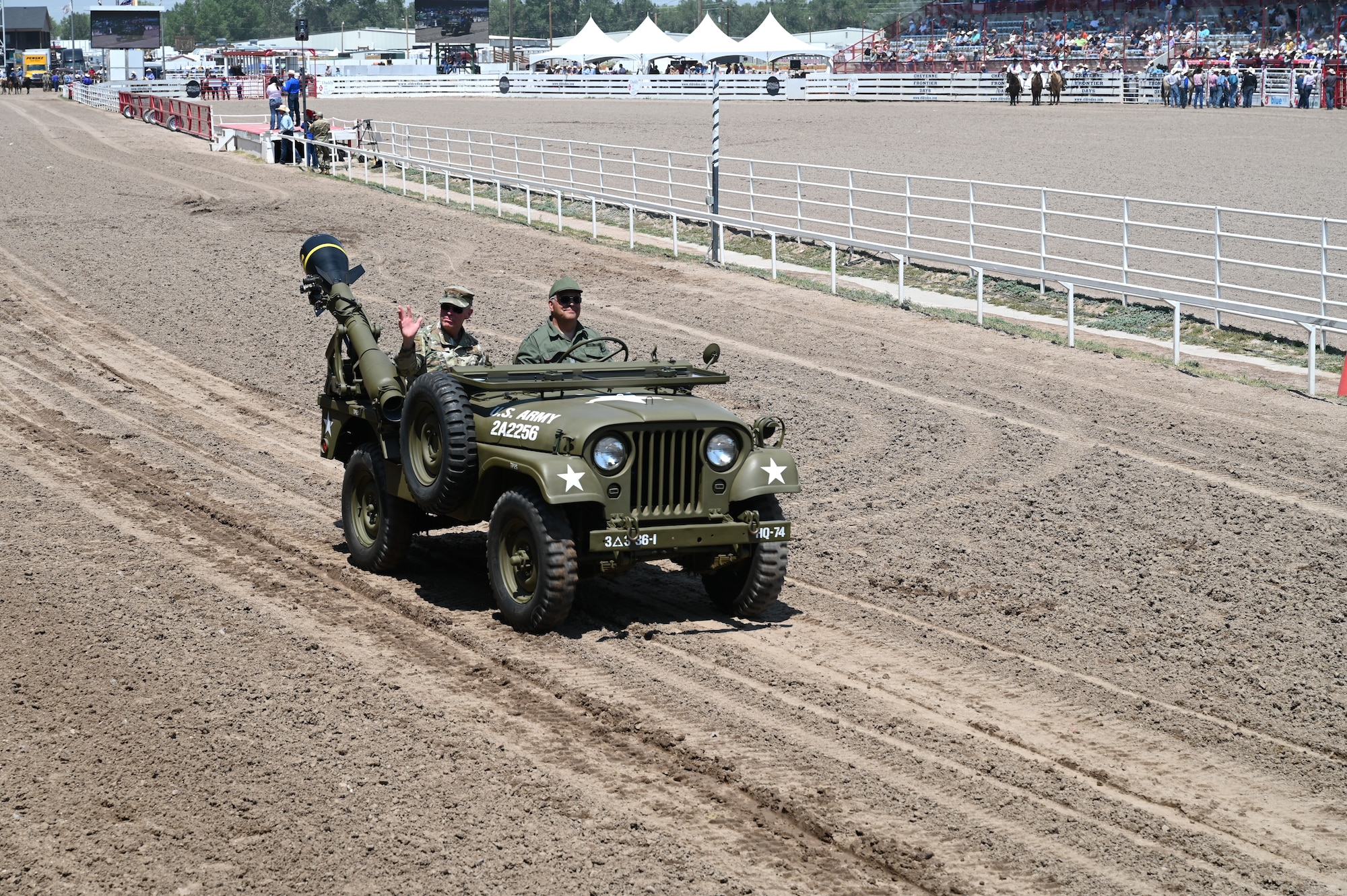 Maj. Gen. Michael Lutton, 20th Air Force commander, enters Frontier Park during the grand entrance to Military Monday at Frontier Park in Cheyenne, Wyoming, July 26, 2021. Military Monday honors those serving in the local community and provides an opportunity to showcase the strong relationship between the base and the local community.