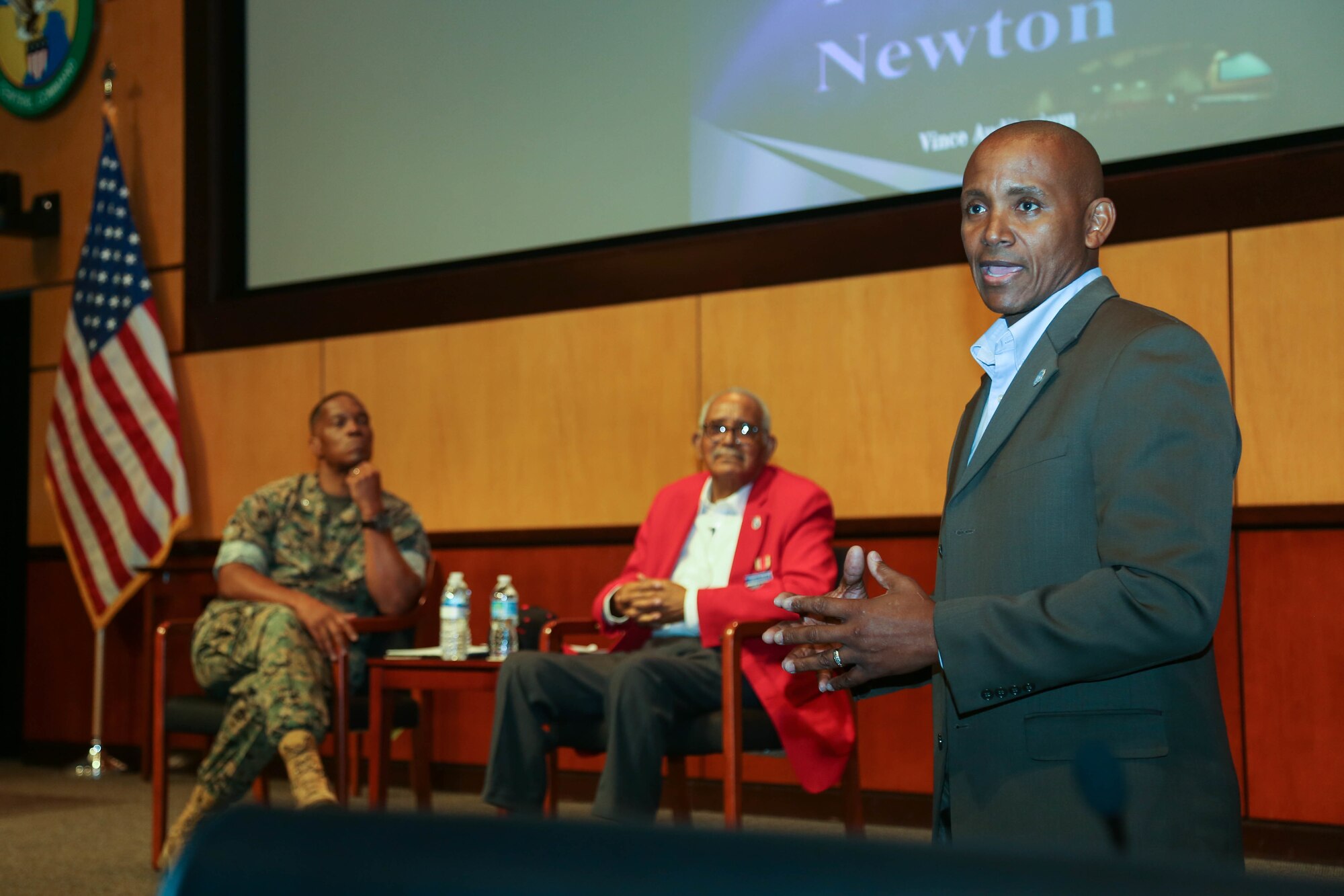 Retired U.S. Air Force Tech. Sgt. Stevie Carmack answers questions about his father’s role in his decision to join the military for a packed audience of U.S. Central Command personnel in the Vince Tolbert Building, MacDill Air Force Base, July 9, 2021. Carmack encouraged his father to become a certified Documented Original Tuskegee Airman, which officially certified that U.S. Army Air Forces Sgt. Thomas Newton served with the historically significant 99th Fighter Squadron. (U.S. Army photo by Spc. Robert Vicens)