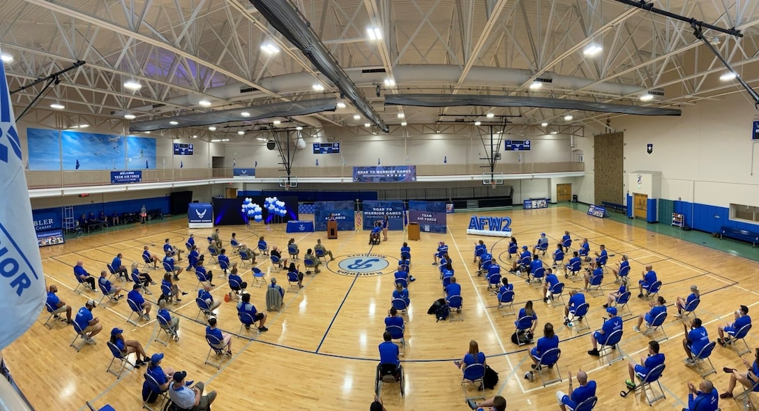 The Air Force Wounded Warrior Program hosts its first live in-person event since the beginning of 2020, July 25, 2021, at the Rambler Fitness Center at Joint Base San Antonio-Randolph, Texas. Distinguished visitors and guests welcomed Team Air Force to the week-long training event in preparation for the upcoming Department of Defense Warrior Games, Sept. 12-22, 2021, in Orlando, Fla. (U.S. Air Force Photo by Melissa Espinales)