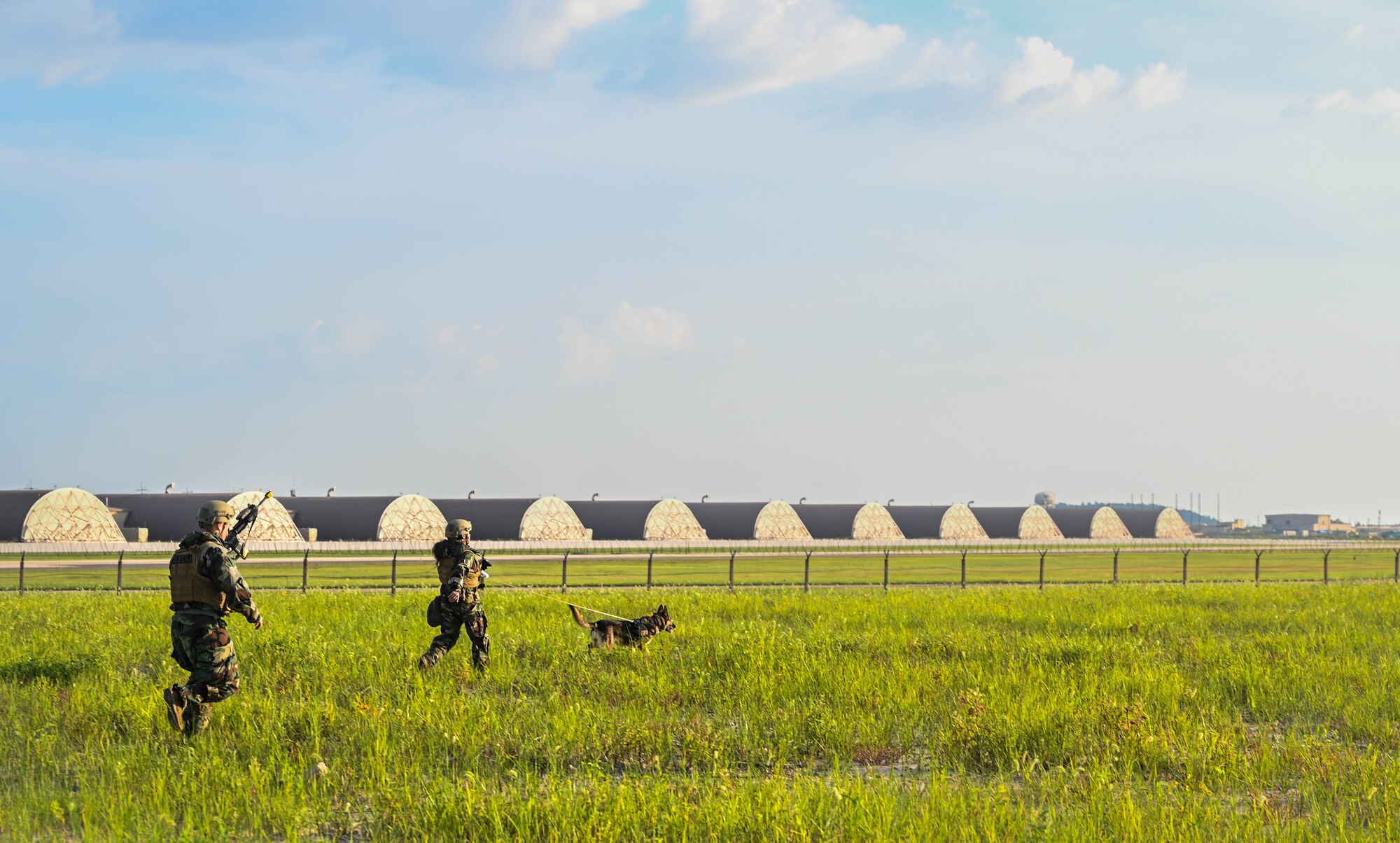 Airman participate in tackle apprehension.