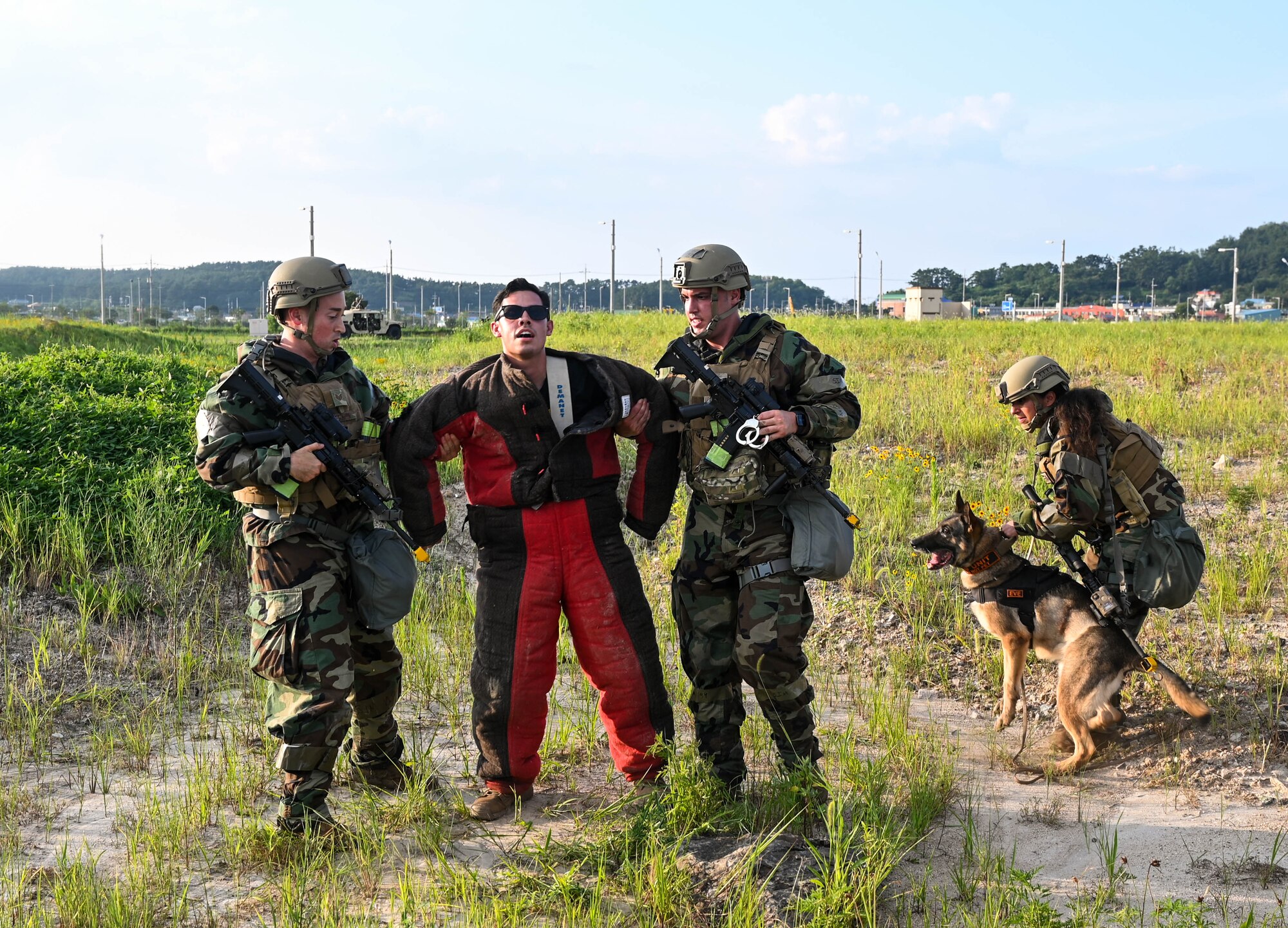 Airman arrest a simulated perpetrator.