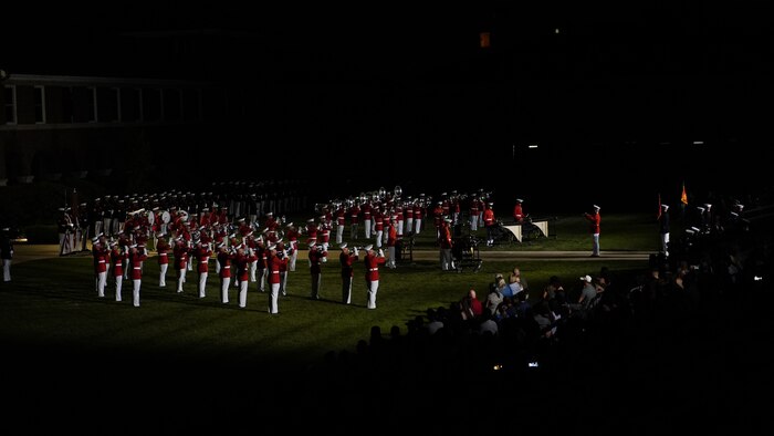 Marines with “The Commandant’s Own,” U.S. Marine Drum and Bugle Corps, perform during the Friday Evening Parade, July 23, 2021.