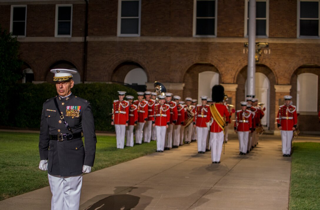 Lieutenant Col. Darrel L. Choat, executive officer, Marine Barracks Washington, stands at the position of attention during the Friday Evening Parade at MBW, July 23, 2021.