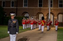 Lieutenant Col. Darrel L. Choat, executive officer, Marine Barracks Washington, stands at the position of attention during the Friday Evening Parade at MBW, July 23, 2021.