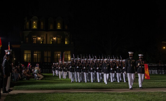 Marines with Alpha Company, Marine Barracks Washington conduct “pass in review” during the Friday Evening Parade at MBW, July 23, 2021.