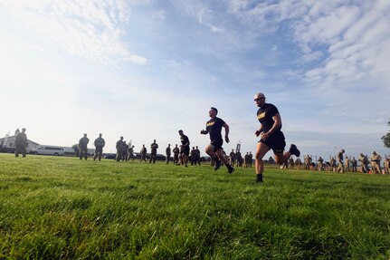 Army Cpl. Dakoatah M. Miller, center, an infantryman with the New York Army National Guard’s 2nd Battalion, 108th Infantry Regiment, and Spc. Addison Smith, right, a cavalry scout with the Texas Army National Guard’s 1st Battalion, 112th Cavalry Regiment, sprint to a marking point during the physical fitness event of the 2021 Army National Guard Best Warrior Competition at Camp Navajo, Arizona, July 20, 2021. The competition spans three physically and mentally demanding days where competitors are tested on a variety of tactical and technical skills as they vie to be named the Army Guard’s Soldier and Noncommissioned Officer of the Year. The winners then represent the Army Guard in the Department of the Army Best Warrior Competition later this year.