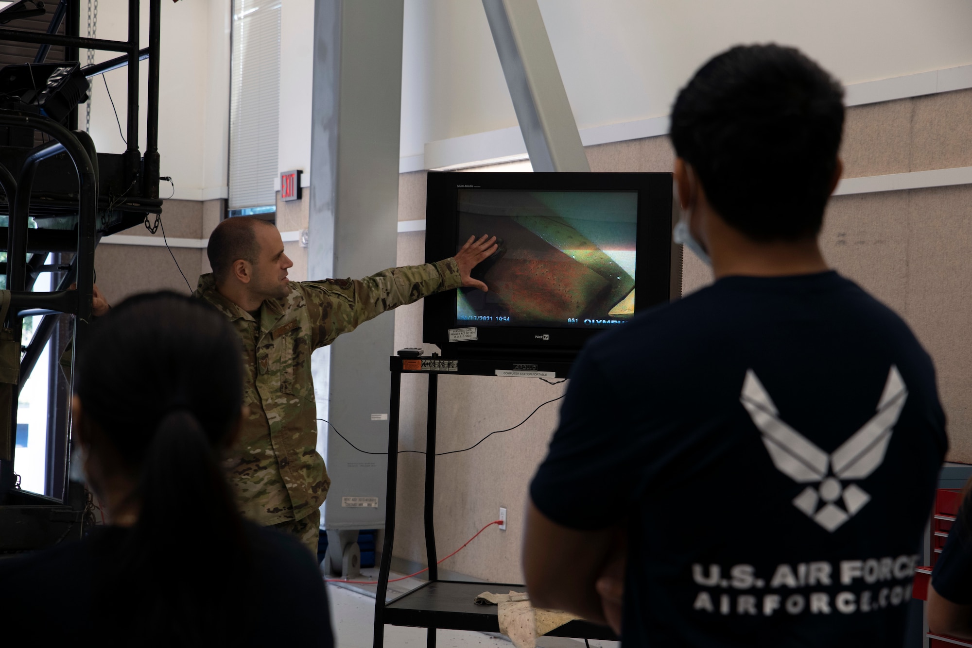 U.S. Air Force recruits in the 361st Recruiting Squadron Delayed Entry Program tour the 373rd Training Squadron at Joint Base Lewis-McChord, Washington, July 23, 2021. The future Airmen and their recruiters visited JBLM to tour different squadrons, a C-17 Globemaster III static display and take the oath of enlistment. (U.S. Air Force photo by Senior Airman Zoe Thacker)