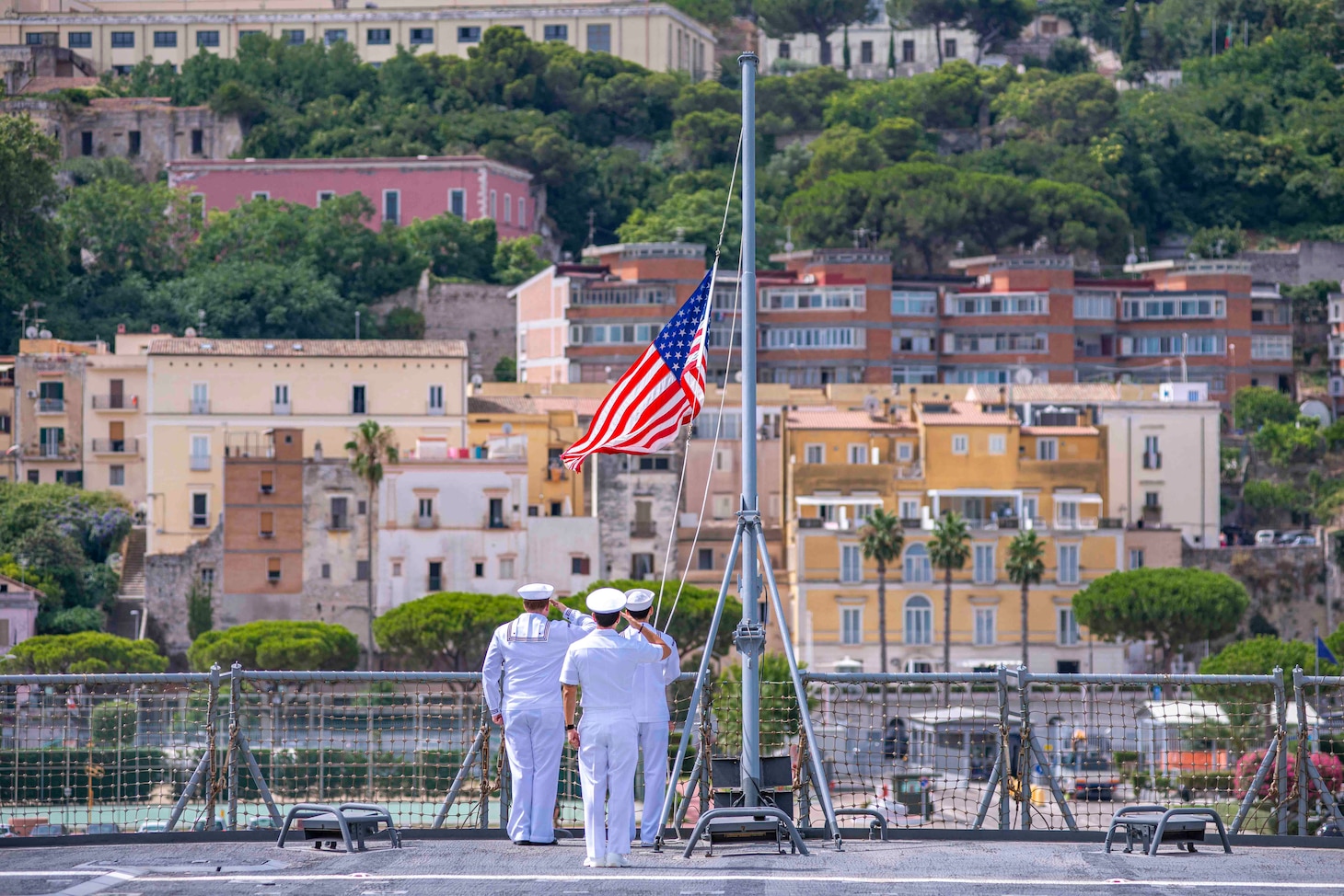 Sailors shift colors aboard the Blue Ridge-class command and control ship USS Mount Whitney (LCC 20) as the ship and embarked U.S. Sixth Fleet staff get underway from Gaeta, Italy, in preparation for Large Scale Exercise, July 27, 2021. Mount Whitney is the U.S. Sixth Fleet flagship, homeported in Gaeta, and operates with a combined crew of U.S. Sailors and Military Sealift Command civil service mariners.