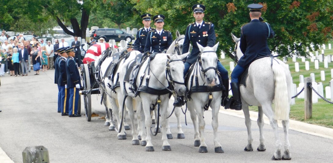 The 3rd Infantry Regiment, also known as the Old Guard, escorts the remains of Army Major Harvey Storms who was buried in Arlington National Cemetery on July 16, 2021. Major Storms was reported missing in action on Dec. 1, 1950, when his unit was attacked by enemy forces near the Chosin Reservoir, North Korea. Following the battle, his remains could not be recovered. The Defense POW/MIA Accounting Agency was able to identify the remains in 2019. (Defense Photo by Ashley M. Wright)