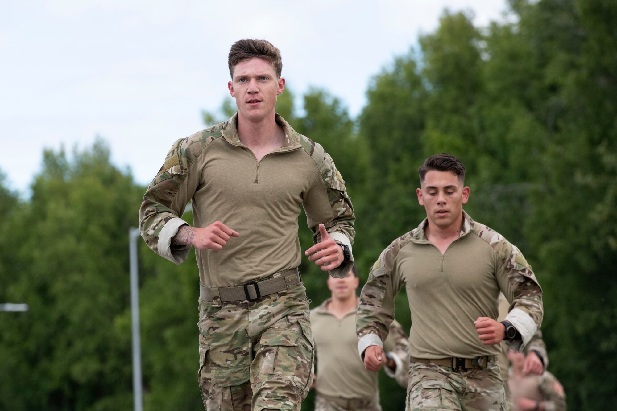 U.S. Air Force tactical air control party specialists compete in a timed run during the Chaos Challenge 2021 at Joint Base Elmendorf-Richardson, Alaska, July 13, 2021. The Chaos Challenge 2021 was a multi-day series of mental and physical contests sponsored by the 1st Air Support Operations Group with participants from the 3rd, 5th, 25th, and 604th Air Support Operations Squadrons and a guest team from the 673d Security Forces Squadron. The winner of the competition will go on to compete in Lightning Challenge 2021 to determine the best two-man TACP team in the Air Force.
