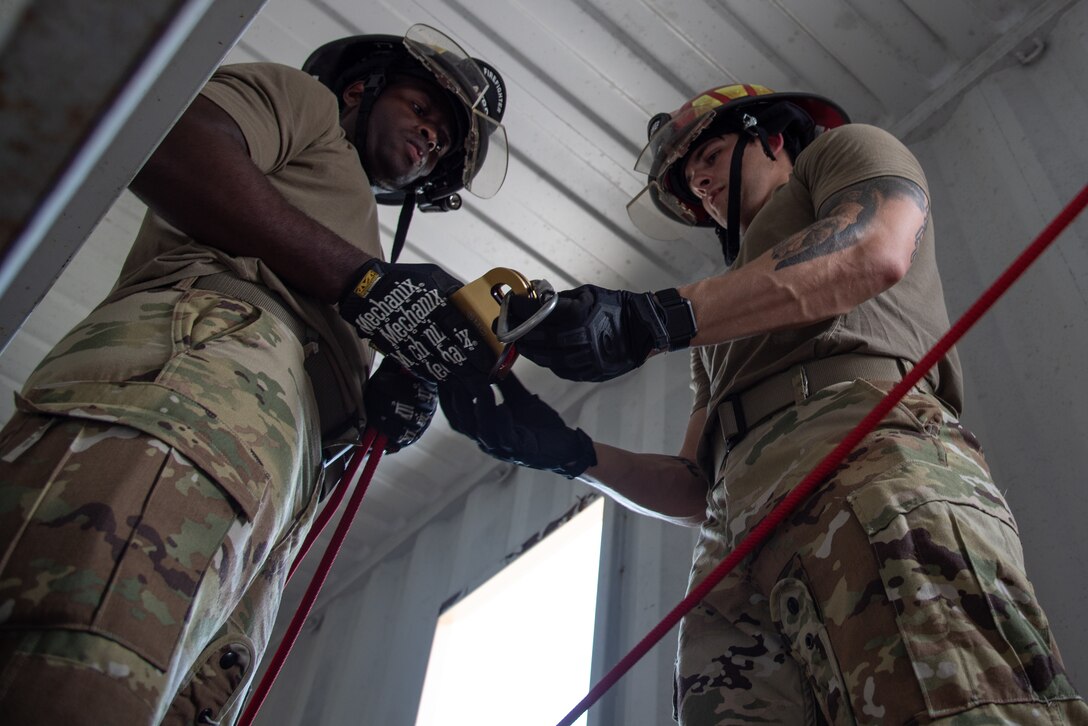 Citizen Airman, assigned to the 932nd Airlift Wing, Mission Support Group, Civil Engineering Squadron, participate in confined space training, at Scott Air Force Base, Illinois, July 11, 2021. This training is conducted to highlight and reduce the risks associated with confined space operations. (U.S. Air Force Photo by Staff Sgt. Brooke Spenner)