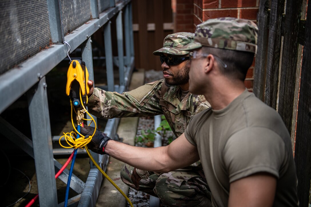 Civil Engineering Squadron Citizen Airman repaired a heating ventilation air conditioning system at the Child Development Center on Scott Air Force Base, Ill., July 10, 2021.(U.S. Air Force photo by Master Sgt. Christopher Parr)