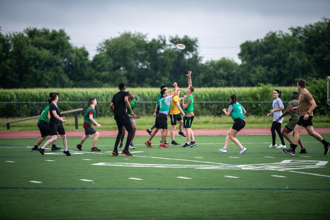 The 932nd Airlift Wing, Development and Training Flight plays ultimate Frisbee, Scott Air Force Base, Ill., July 10, 2021. During unit training assemblies the DT&F members participate in various activities. (U.S. Air Force photo by Master Sgt. Christopher Parr)