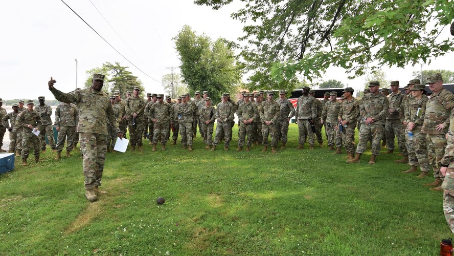 Maj. Herman Marshall, support operations and mobilization and power projection planner, U.S. Army Sustainment Command, briefs ASC officers on artillery used during the Battle of Credit Island during a staff ride at Credit Island, Iowa, July 20.