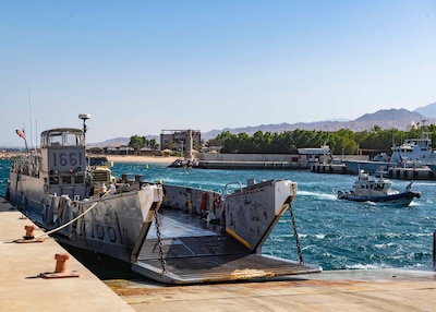 AQABA, Jordan (June 3, 2021) Landing Craft, Utility (LCU) 1661, attached to Assault Craft Unit (ACU) 2, offloads vehicles during LCU operations in Aqaba, Jordan, June 3. ACU-2 is is deployed with dock landing ship USS Carter Hall (LSD 50) to the U.S. 5th Fleet area of operations in support of naval operations to ensure maritime stability and security in the Central Region, connecting the Mediterranean and Pacific through the western Indian Ocean and three strategic choke points. (U.S. Navy photo by Mass Communication Specialist Seaman Sawyer Connally)
