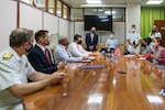 (July 27, 2021) Rear Adm. Jeffrey Spivey, director, Maritime Partnership Program, U.S Naval Forces Europe-Africa, left, U.S. Embassy Acting Deputy Chief of Mission Thom Kohl, center left, and Seychelles Minister for Internal Affairs, Errol Fonseka, attends the official signing of the bilateral agreement between the United States and Seychellois Governments on Countering Illicit Transnational Maritime Activity Operations in conjunction with exercise Cutlass Express 21, July 27, 2021 at the Independence House Annex in Seychelles. This is the first bilateral maritime Agreement between the United States and an East African country.