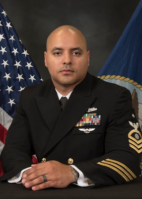 Official portrait of Senior Chief Quartermaster Luis G. Torres.