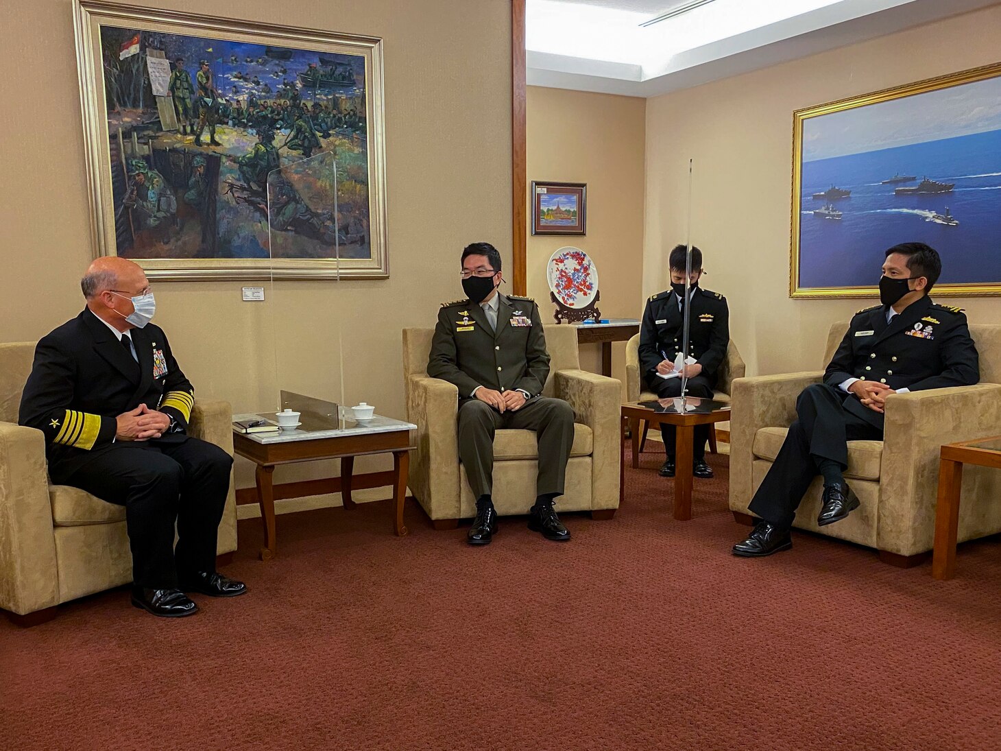 SINGAPORE (July 26, 2021) - Chief of Naval Operations (CNO) Adm. Mike Gilday meets with Chief of Defence Force, Singapore Armed Forces Lieutenant-General Melvyn Ong and Chief of Navy, Republic of Singapore Navy Rear Adm. Aaron Beng during a trip to the region. Gilday visited the region to meet with senior military and government leadership to reaffirm the U.S. Navy’s commitment to our partners and allies and help keep the seas open and free. (U.S. Navy photo by Cmdr. Nate Christensen/Released)