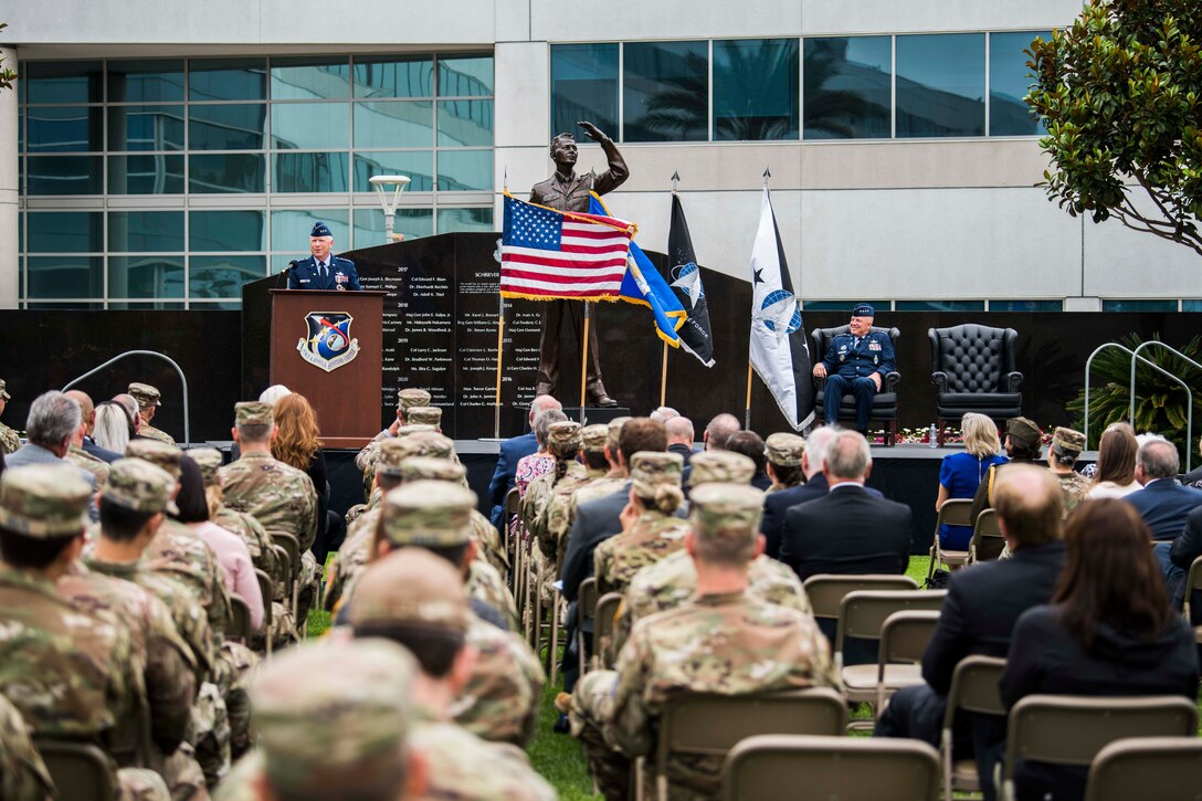 U.S. Air Force Lt. Gen. John F. Thompson, Space and Missile Systems Center commander and Department of the Air Force Program Executive Officer for Space, speaks during his retirement ceremony at Los Angeles Air Force Base, California on July 27, 2021. Thompson thanked his wife, Ruth Anne and children Margaret, Johnny and Claire (who attended virtually), who received certificates of appreciation reflecting their numerous contributions that have made positive impacts to the nation’s defense. (U.S. Space Force photo by Staff Sgt. Luke Kitterman)